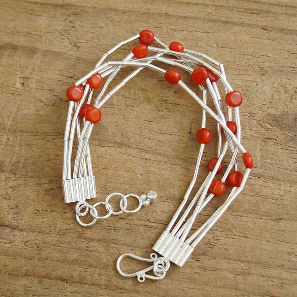 Full view of 6-strand red coral bracelet with silver clasp, 20cm length with extension, handmade by designer Sultan in Bodrum