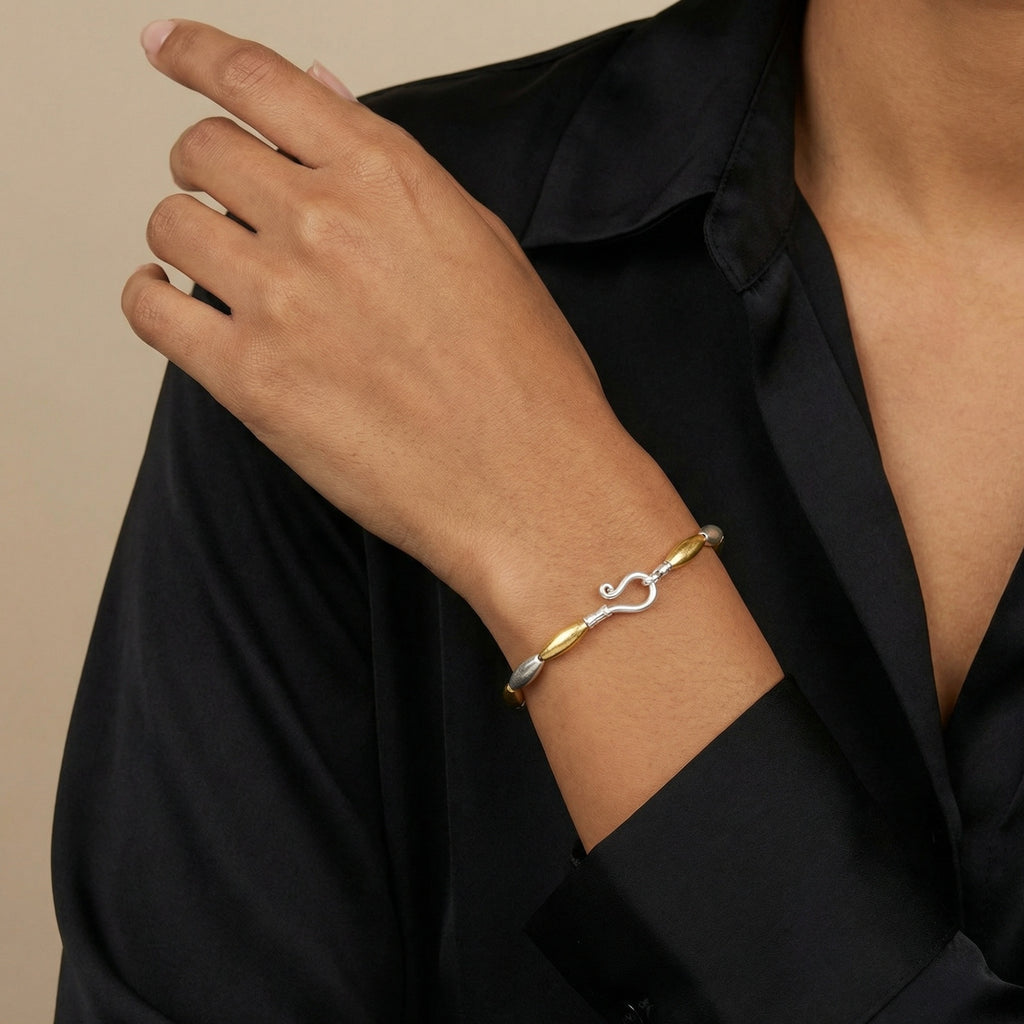 Bicolor Troy wheat bracelet detail showing 925 silver and 24K gold plating, handcrafted Turkish artisan jewelry from Bodrum atelier

