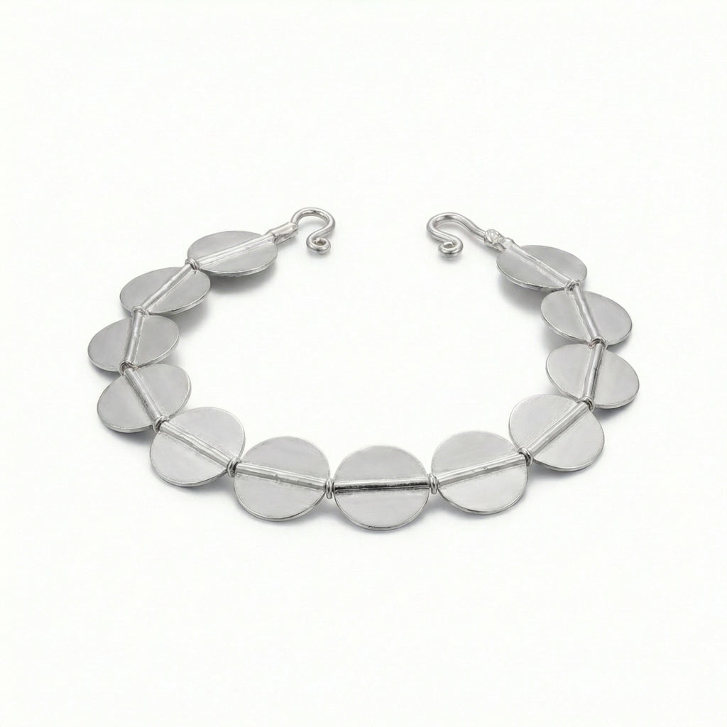 Ancient Troy heritage bracelet in 925 silver with optional gold plating, featuring circular discs symbolizing eternity, handcrafted artisan jewelry by Sultan