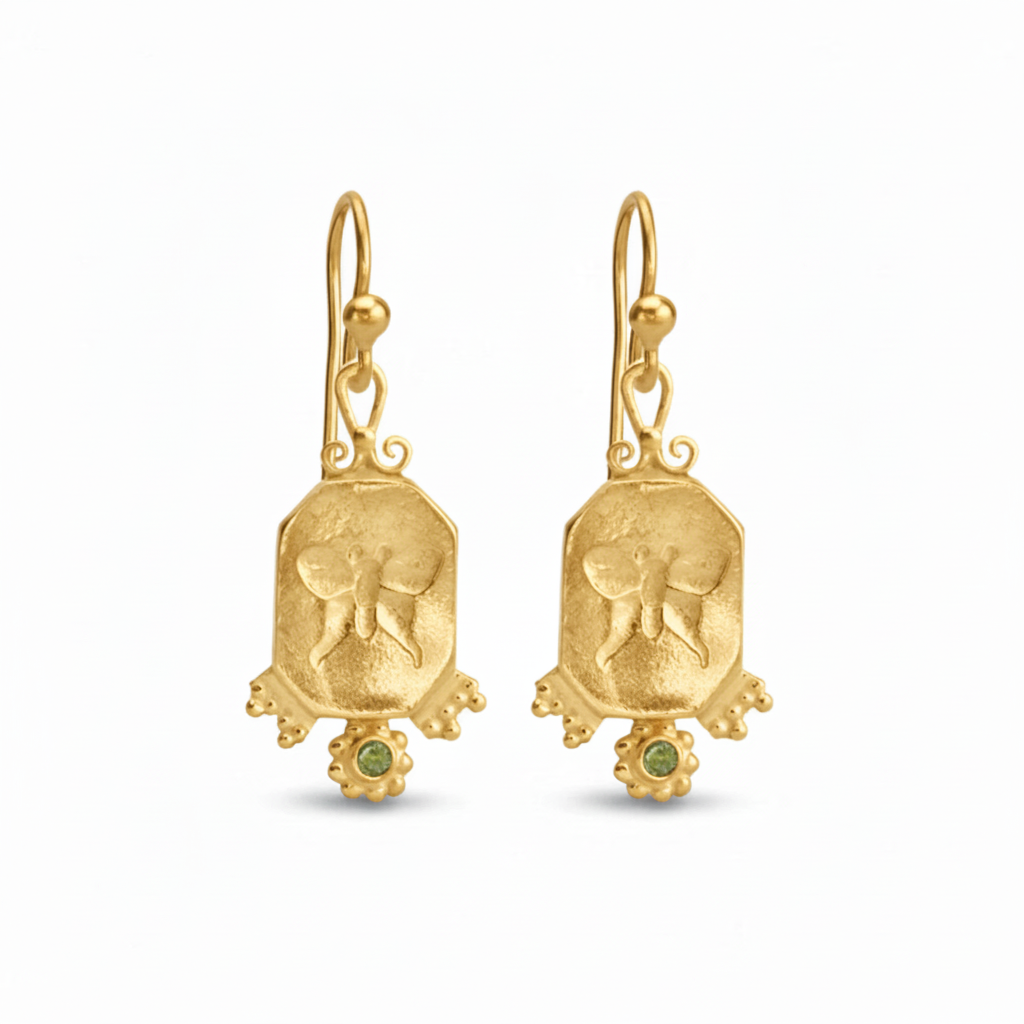 Close-up of butterfly coin earrings showing intricate ancient-inspired design, 925 silver Turkish jewelry
