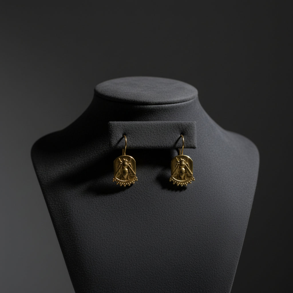Gold bee coin earrings on model, 925 silver jewelry with ancient motif, perfect gift for women who love unique designer pieces
