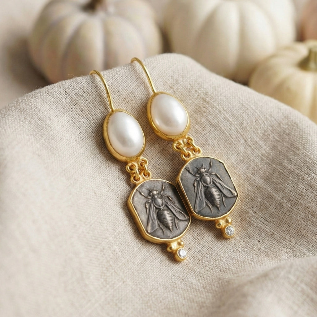Gold bee pearl earrings on model, 925 silver jewelry with ancient motif and freshwater pearls, perfect gift for women who love designer pieces
