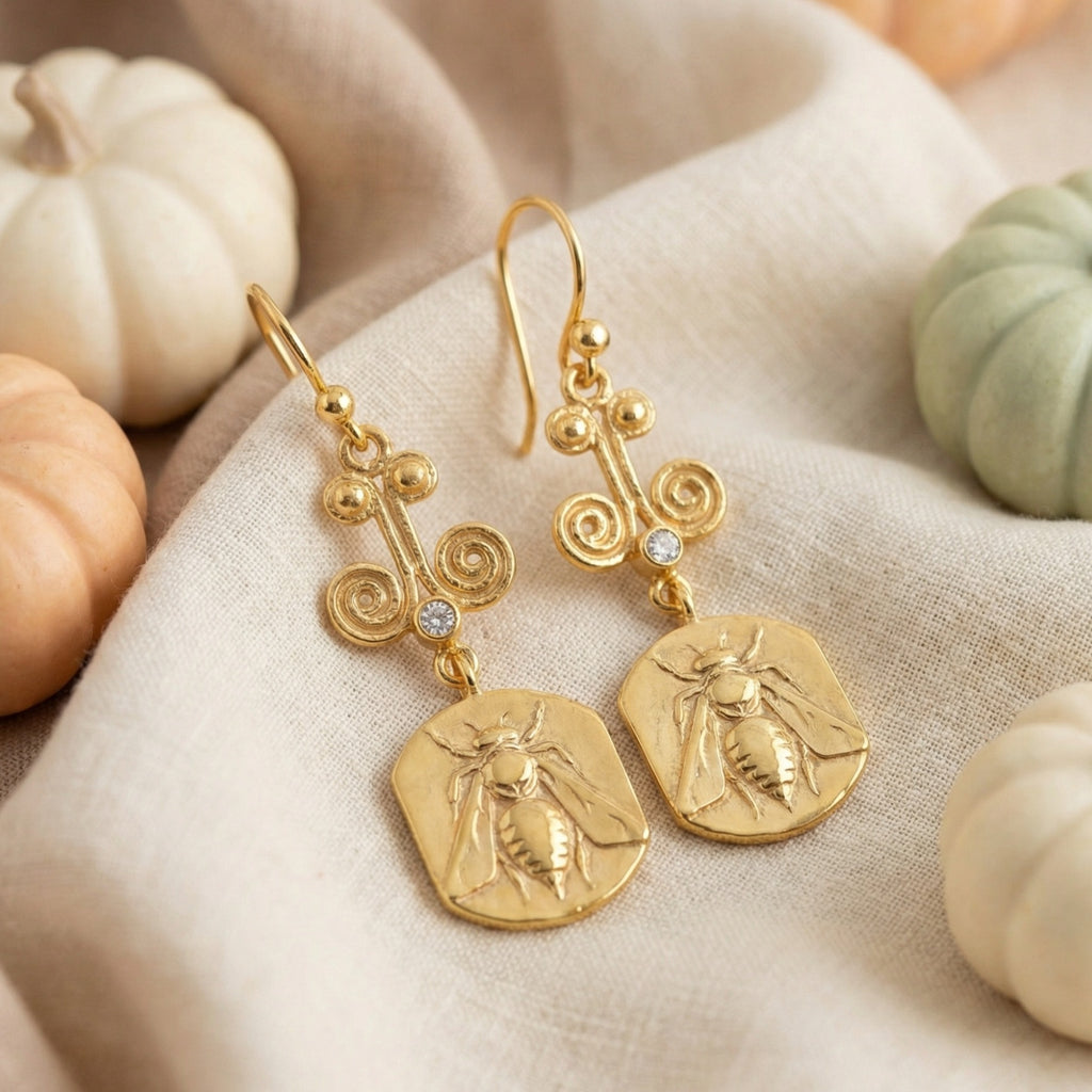 Gold bee coin earrings on model, 925 silver jewelry with ancient motif, perfect gift for women who love unique designer pieces

