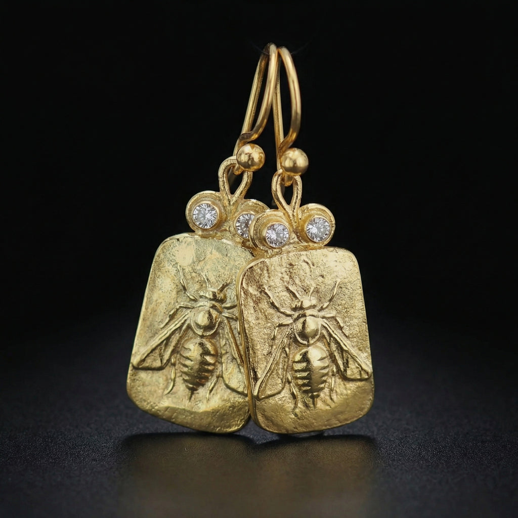 Designer gold bee earrings inspired by ancient civilizations, handcrafted 925 silver jewelry from Bodrum workshop
