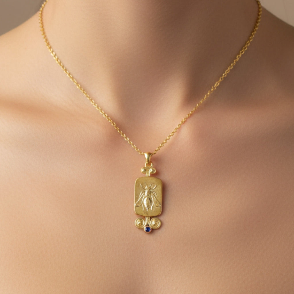 Artisan Bee Coin necklace with Roman coin and topaz, handmade by Sultan in Bodrum, Turkish designer jewelry celebrating heritage with 925 silver
