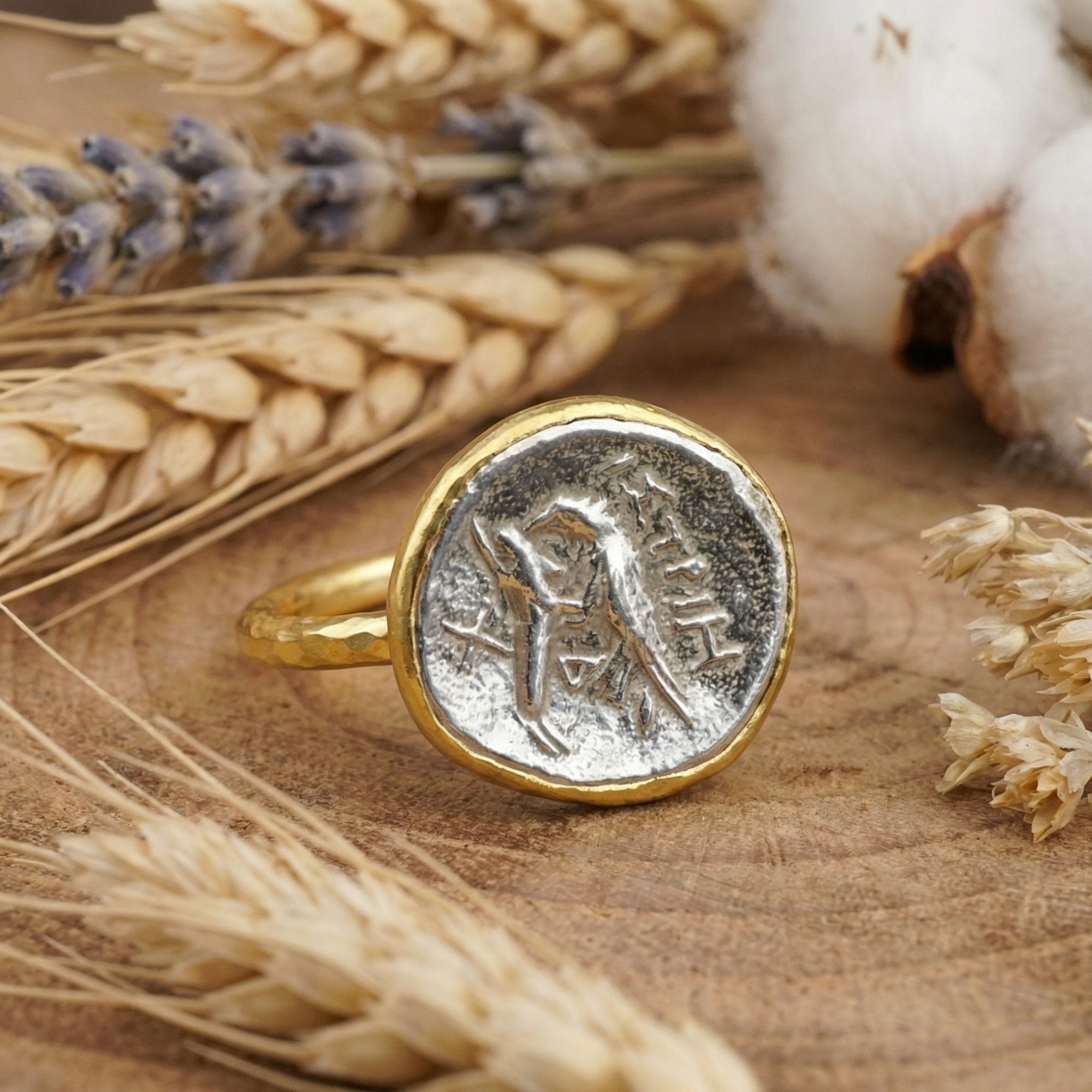 Roman coin ring on hand, handcrafted by Sultan Yılmaz, Bodrum artisan