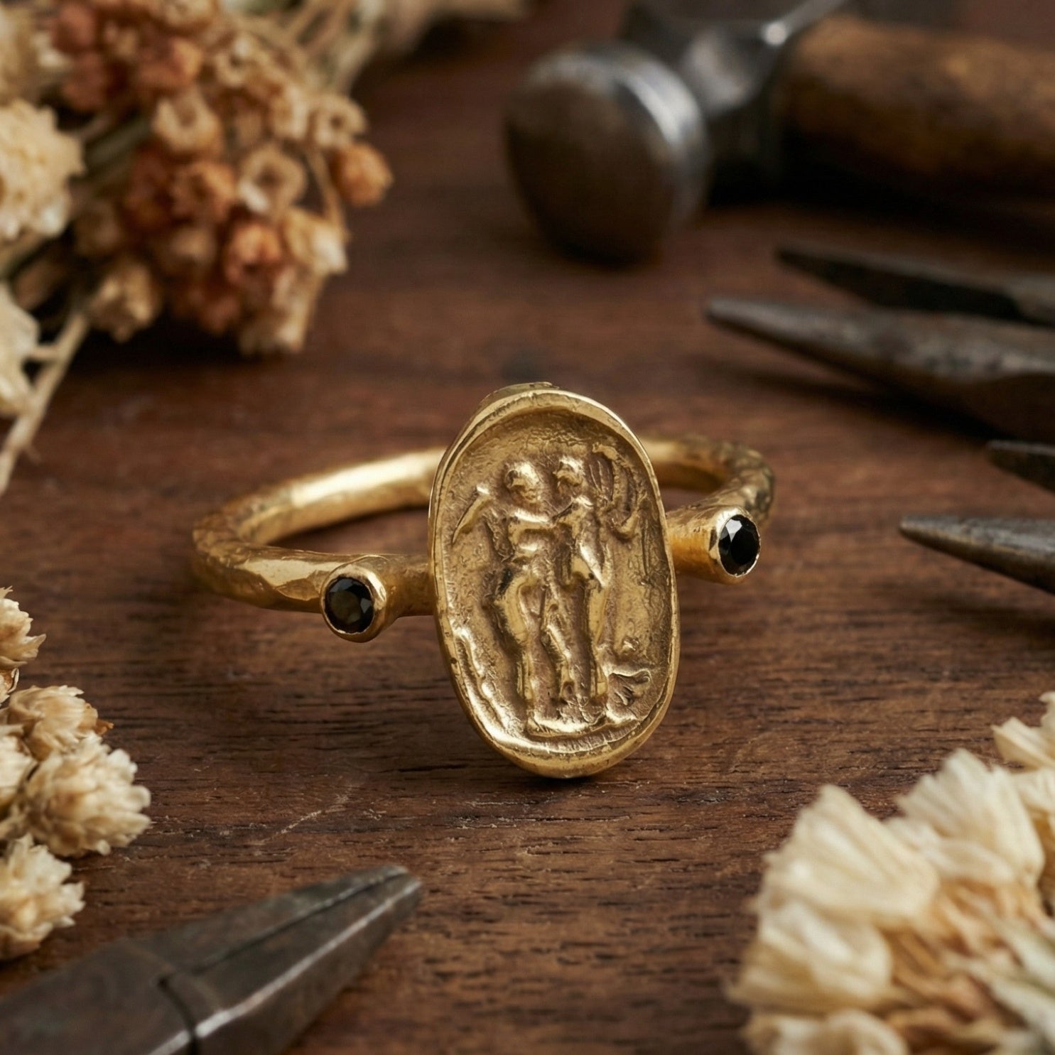 Gold plated black onyx ring on hand, handcrafted Turkish artisan jewelry