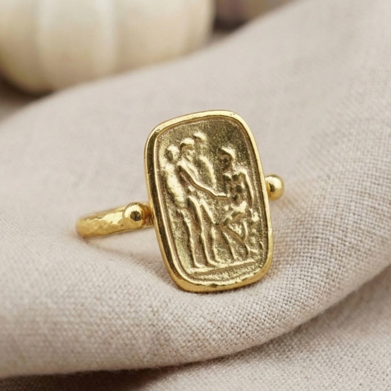 Hammered coin ring on hand, handcrafted by Sultan Yılmaz, Turkish jewelry