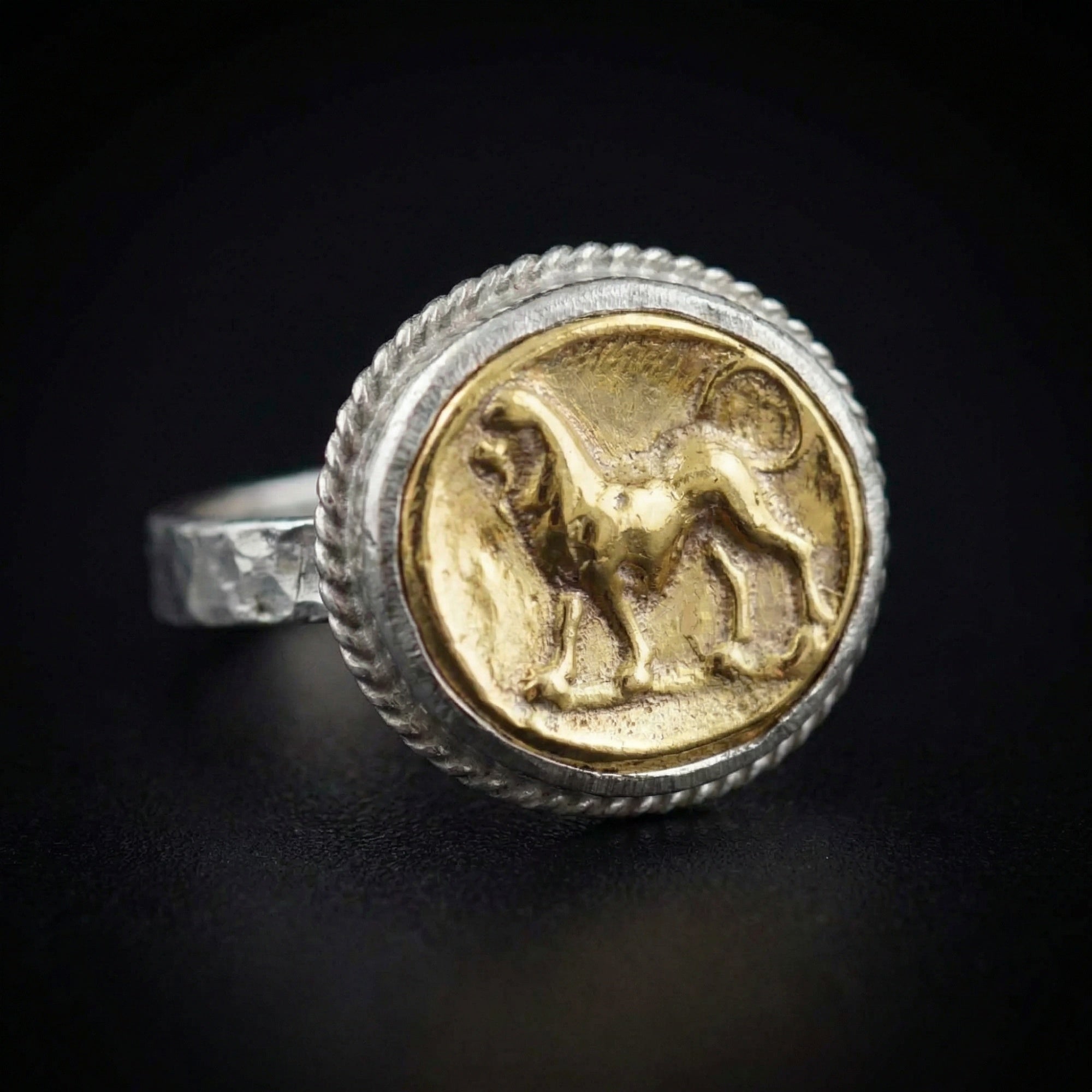 Hammered lion ring close-up showing ancient coin reproduction, handcrafted 925 silver artisan jewelry
