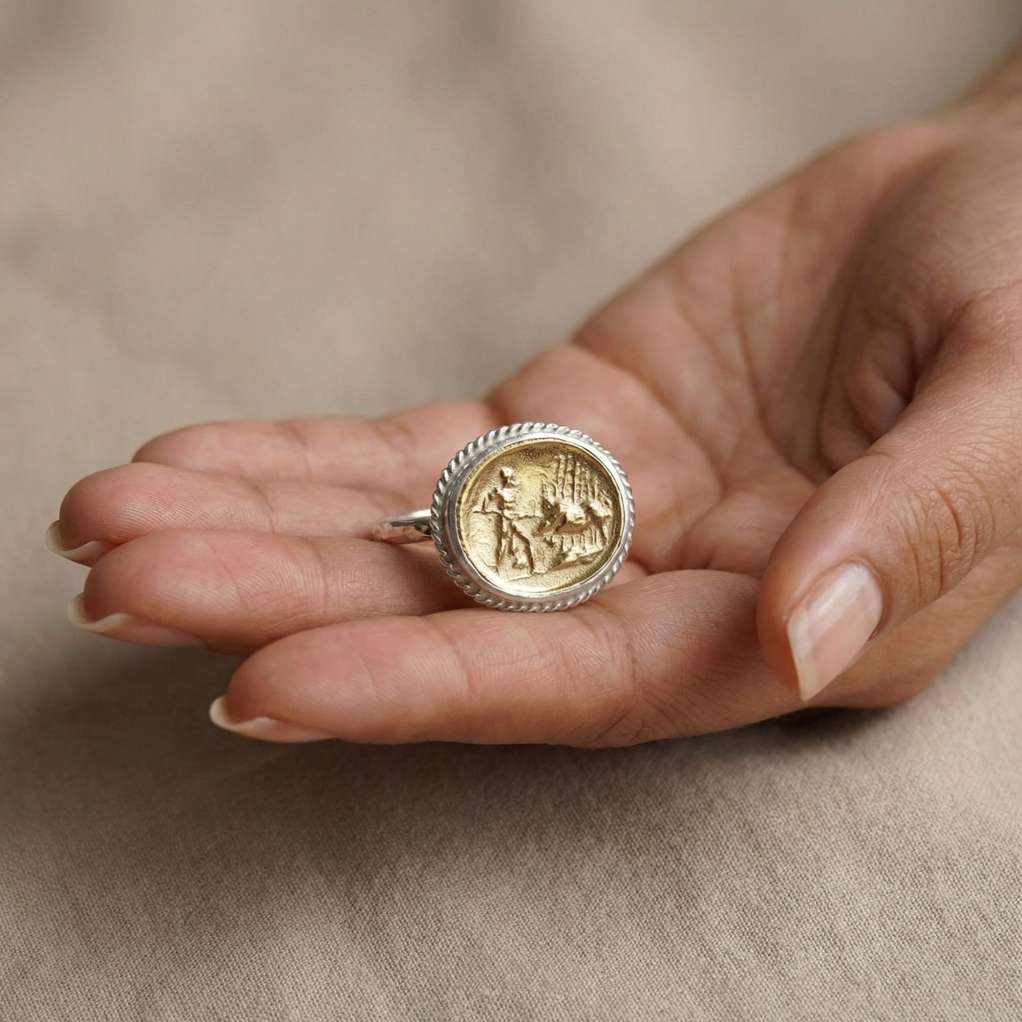 Designer fighter coin ring detail showing 925 silver craftsmanship and gold plating, unique artisan design