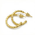 Handmade twisted hoop earrings in 925 sterling silver with gold plating, artisan jewelry by Sultan Yilmaz Bodrum featuring ancient Anatolian design

