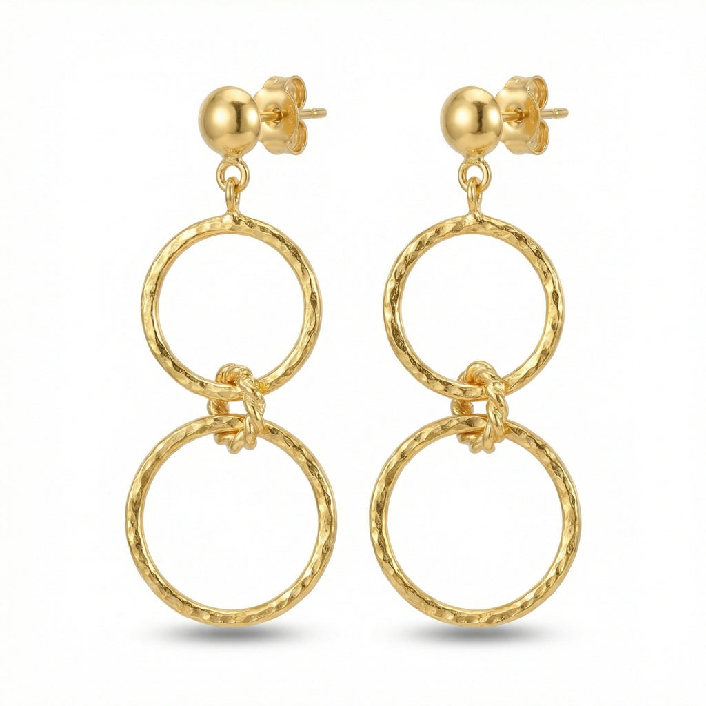 Handmade hammered double hoop earrings in 925 sterling silver with gold plating, artisan jewelry by Sultan Yilmaz Bodrum featuring ancient Anatolian design
