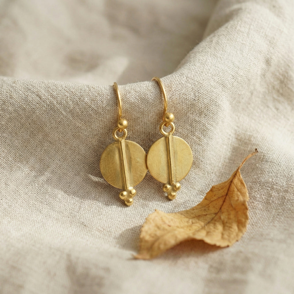 Statement ancient disc earrings in 925 sterling silver with sun motif, handcrafted artisan Turkish jewelry gift symbolizing eternal cycles by Sultan