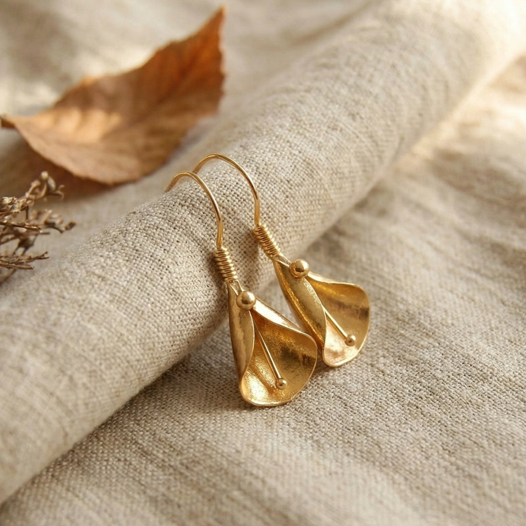 Leaf design dangle earrings in 925 sterling silver with gold plating, handcrafted Turkish artisan jewelry by designer Sultan Bodrum
