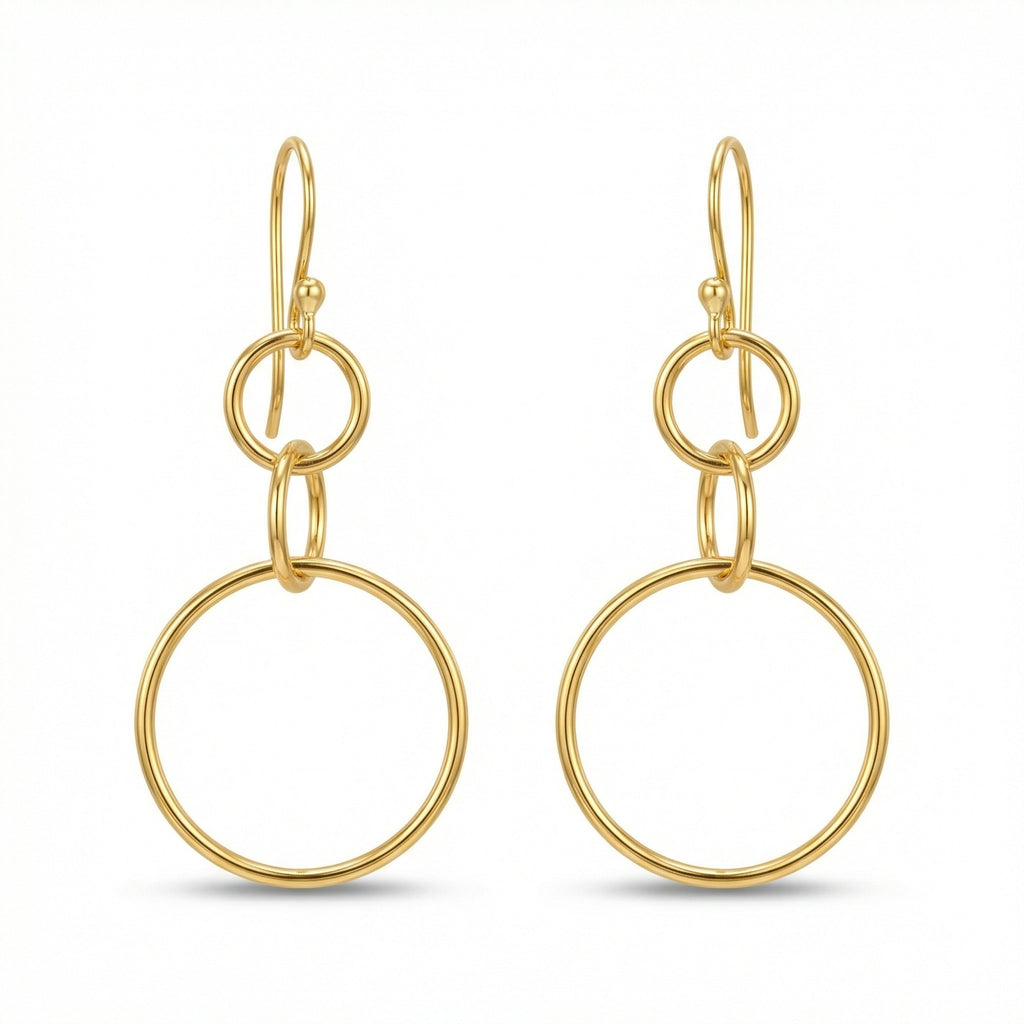 Handmade circle dangle earrings in 925 sterling silver with gold plating, artisan jewelry by Sultan Yilmaz Bodrum featuring ancient Anatolian design
