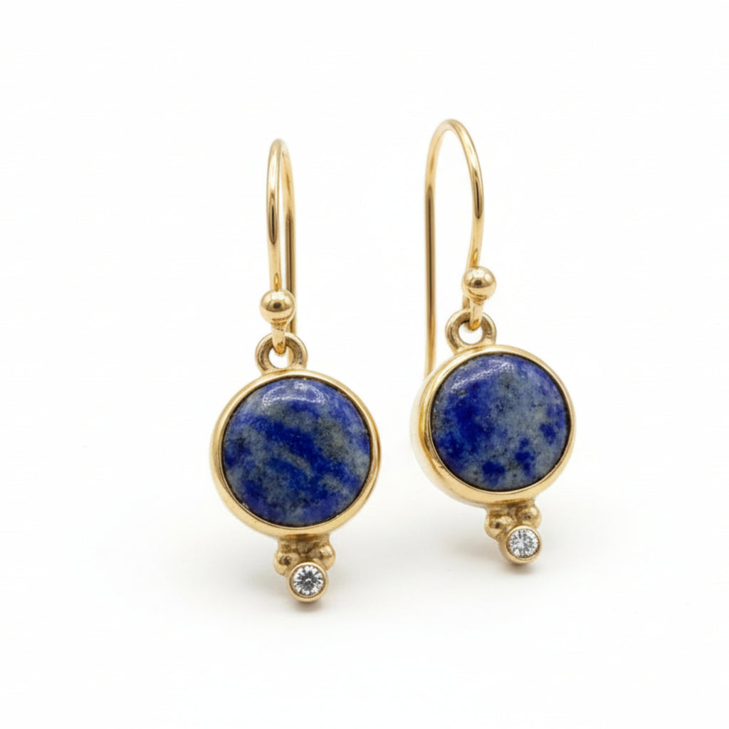 Handmade sodalite dangle earrings in 925 sterling silver with gold plating, artisan jewelry by Sultan Yilmaz Bodrum featuring natural blue gemstones
