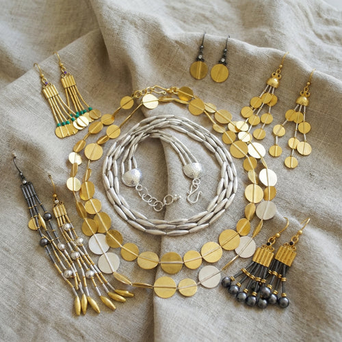 Ancient Troy civilization inspired multi row necklace and earrings collection handcrafted by designer Sultan Turkish jewelry Bodrum atelier