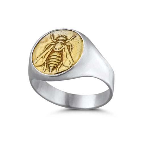 Close-up of Turkish artisan bee coin signet ring showing detailed 24K gold plating and hammered texture, handcrafted in Bodrum
