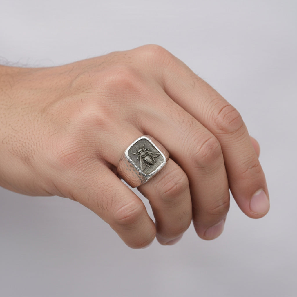 Artisan oxidized bee signet ring detail showing blackened sterling silver finish and hammered texture, handmade Turkish men's jewelry
