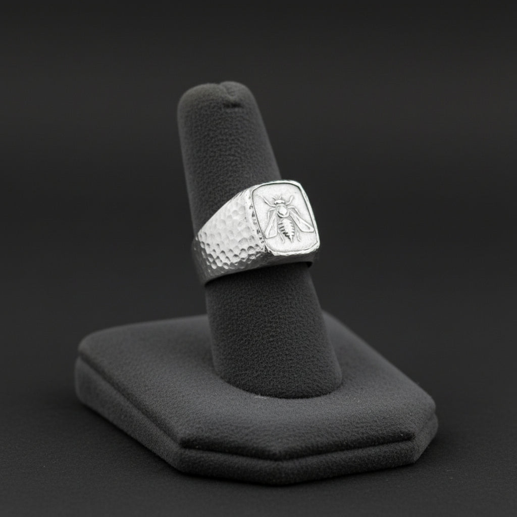 Artisan silver bee signet ring detail showing hammered sterling silver texture, handmade Turkish men's jewelry
