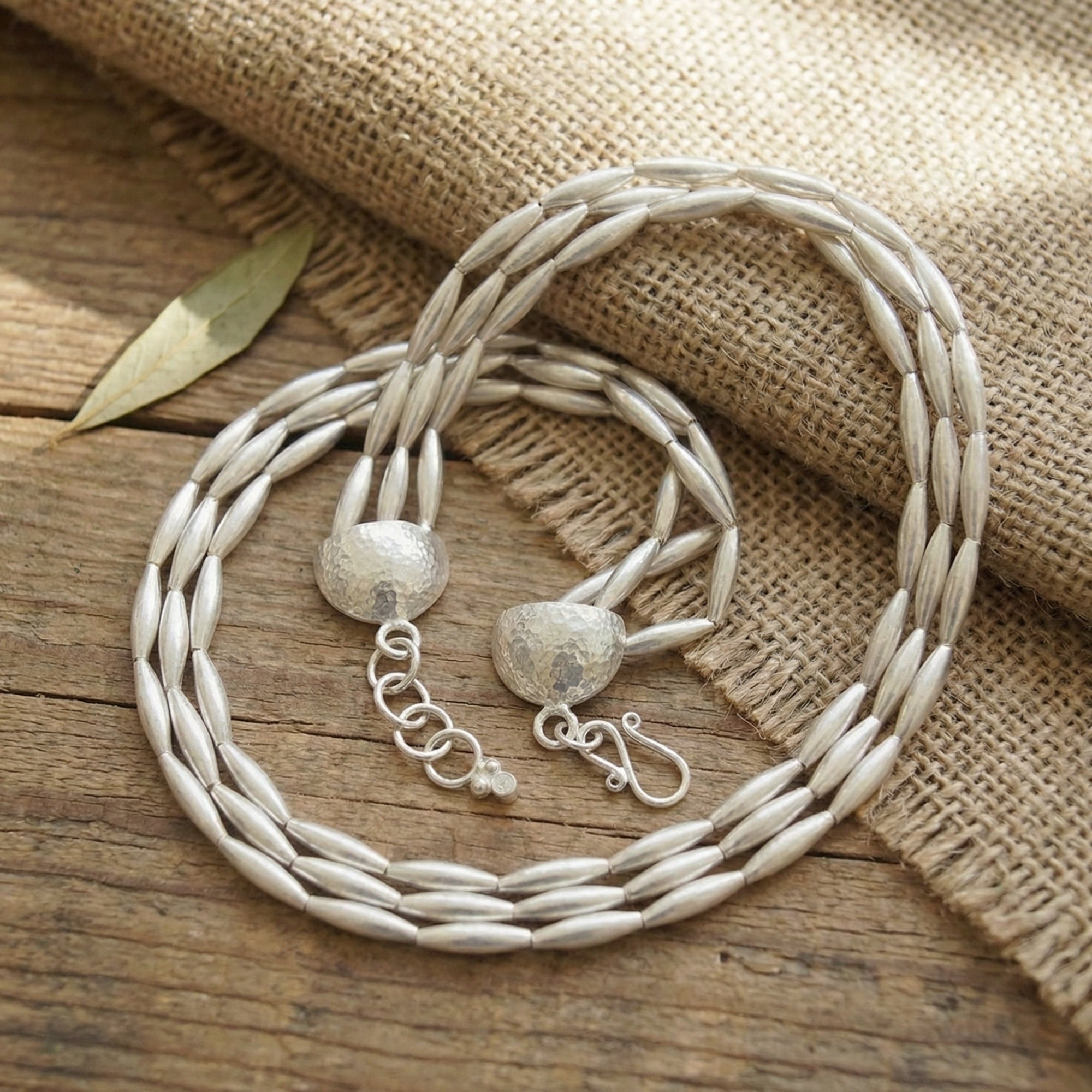 
Full view of artisan gold wheat necklace with three rows of 925 sterling silver spacers, unique handcrafted Turkish jewelry by Sultan
