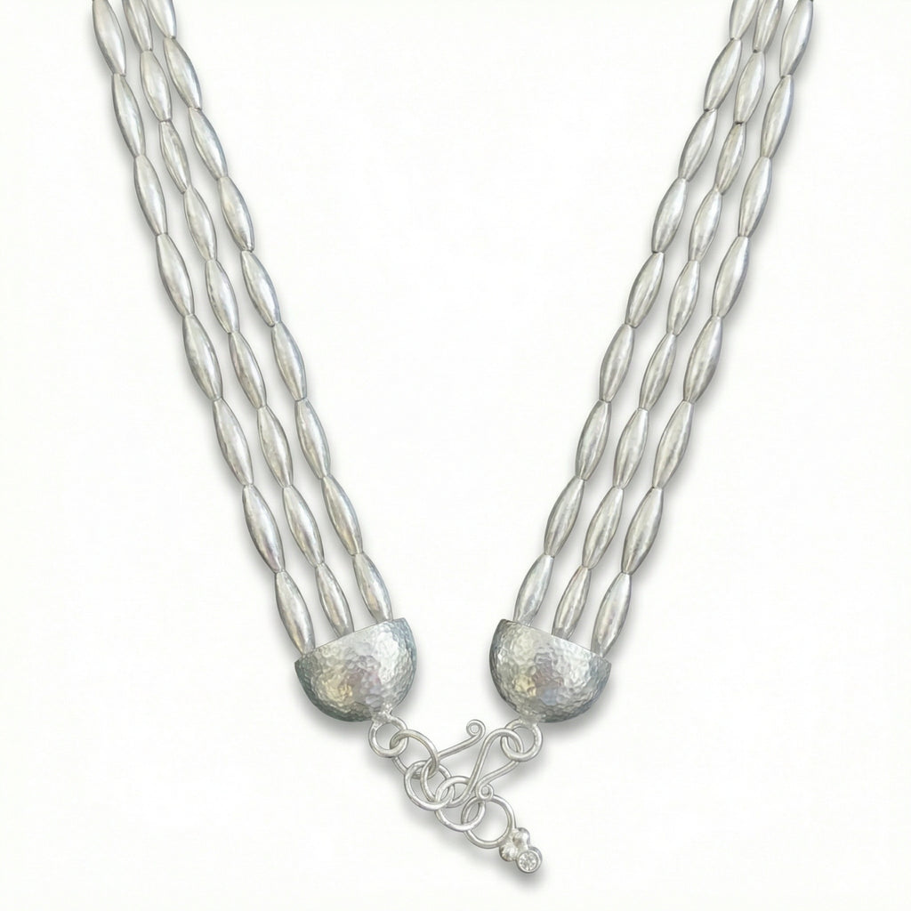 Handmade ancient Troy wheat necklace with three rows of gold-plated 925 sterling silver wheat-inspired spacers, crafted by designer Sultan in Bodrum atelier