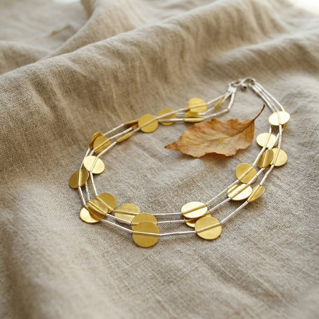 Handmade Ancient Troy inspired necklace detail, 925K sterling silver and 24k gold plated elements, spontaneous arrangement ensuring one-of-a-kind Turkish jewelry piece