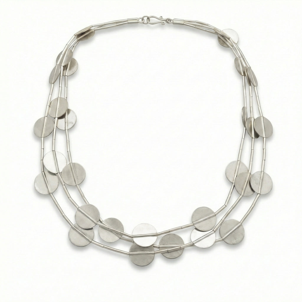 Artisan Ancient Troy necklace crafted in Bodrum studio, 925 silver with gold accents symbolizing historical legacy, unique wearable art by designer Sultan