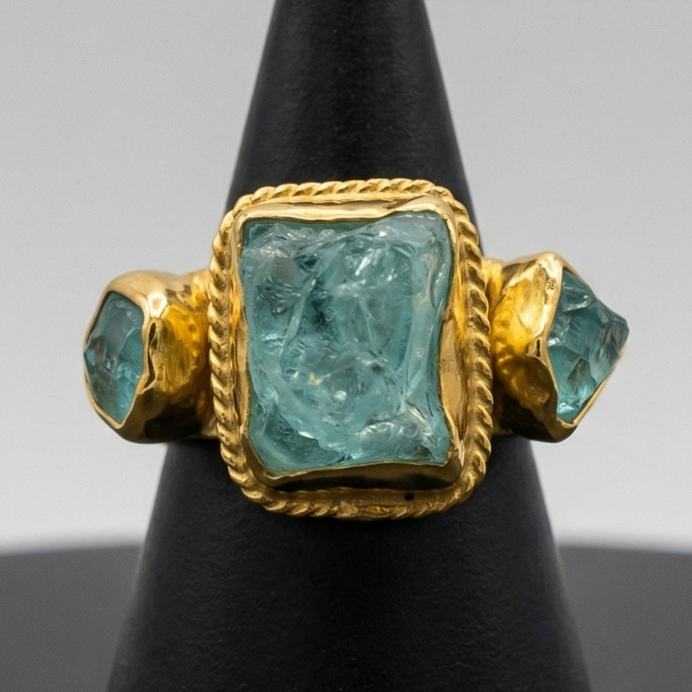 Artisan blue apatite ring detail showing raw natural gemstone on hammered sterling silver, handmade Turkish jewelry
