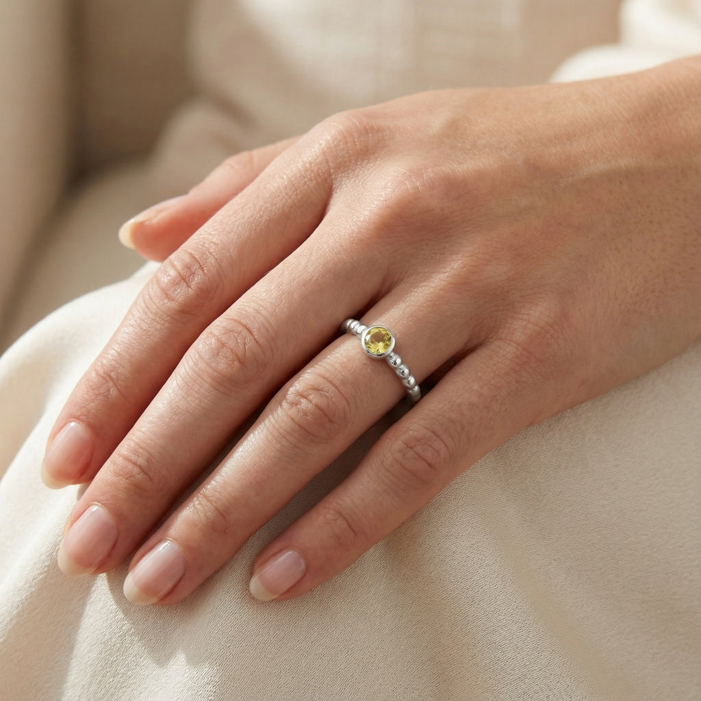 Close-up of Turkish artisan hammered silver stack ring showing detailed texture, handcrafted in Bodrum atelier
