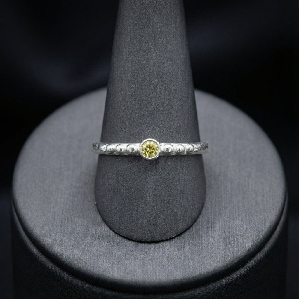 Artisan hammered silver ring detail showing textured sterling silver finish, handmade Turkish jewelry
