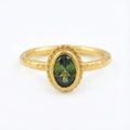 Handmade gold peridot stack ring by Sultan, 925 sterling silver with ancient Roman inspired design, symbol of balance and positive energy
