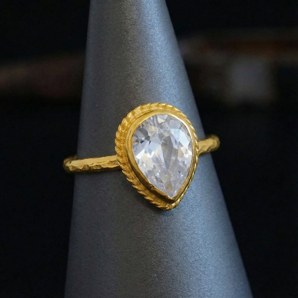 Artisan white topaz pear ring detail showing natural gemstone and gold plating on sterling silver, handmade Turkish jewelry
