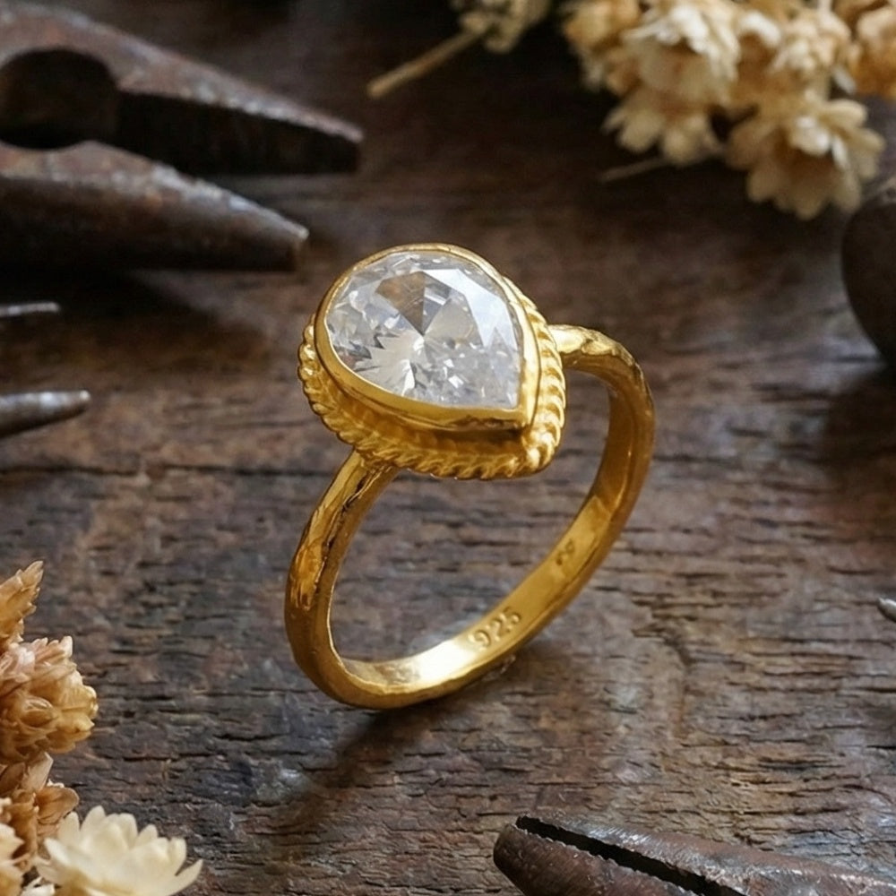 Turkish artisan white topaz pear ring with 24K gold plating, 925 sterling silver jewelry handmade by Sultan in Bodrum atelier
