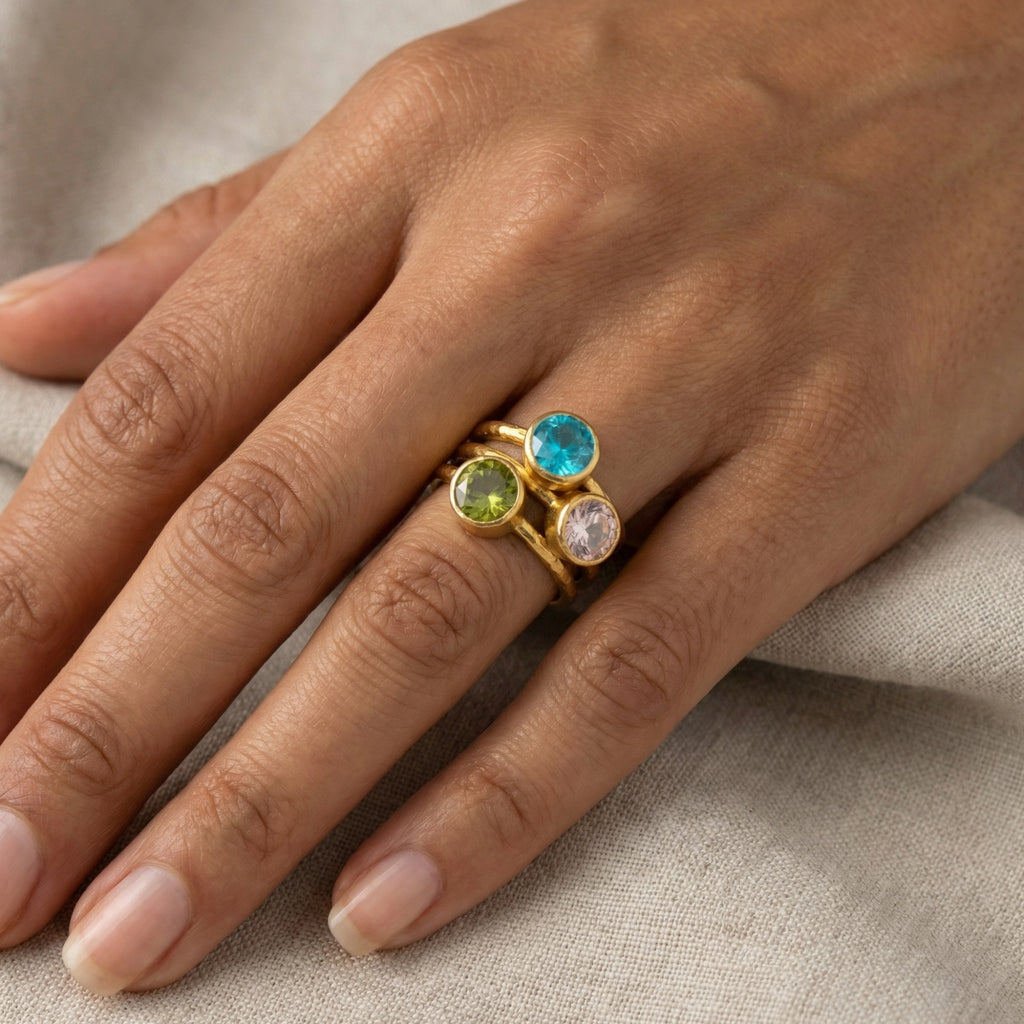  Three-piece gemstone ring set featuring natural peridot and peach topaz stones, symbol of harmony and abundance, artisan Turkish jewelry
