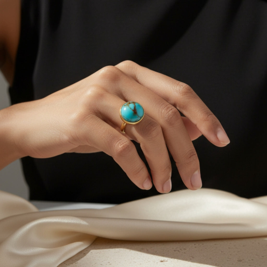 Close-up of Turkish artisan turquoise dome ring showing detailed natural blue stone, handcrafted in Bodrum atelier
