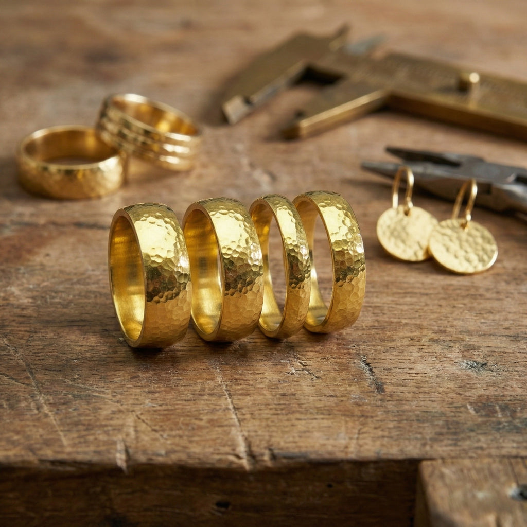 Elegant hammered wedding ring on hand showcasing minimalist design and ancient-inspired metalwork by Atelier Sultan