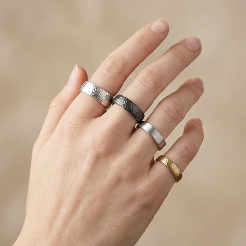 Close-up of blacked silver wedding ring showing hand-hammered artisan craftsmanship from Sultan's Bodrum atelier, ideal for commitment ceremonies and same-sex marriages