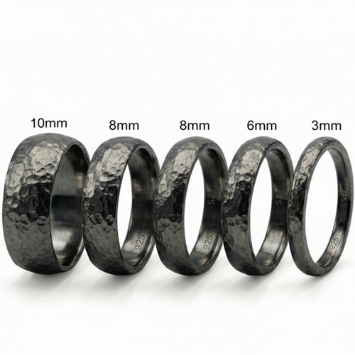  Handmade black oxidized wedding band in 925 sterling silver with hammered texture, crafted by designer Sultan in Bodrum, Turkey, perfect for all couples including LGBTQ+ weddings