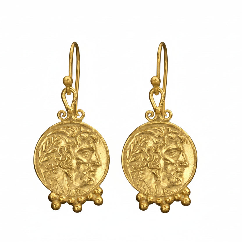 Sultan Alexander coin earrings styled as delicate statement jewelry
