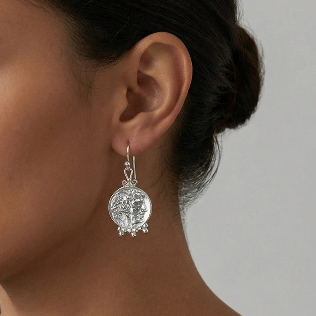 Detailed view of Turkish artisan Alexander coin earrings
