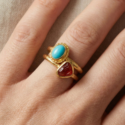 Artisan Ruby Turquoise ring with hammered texture, handmade by Sultan in Bodrum, Turkish designer jewelry celebrating dual symbolism with 925 silver