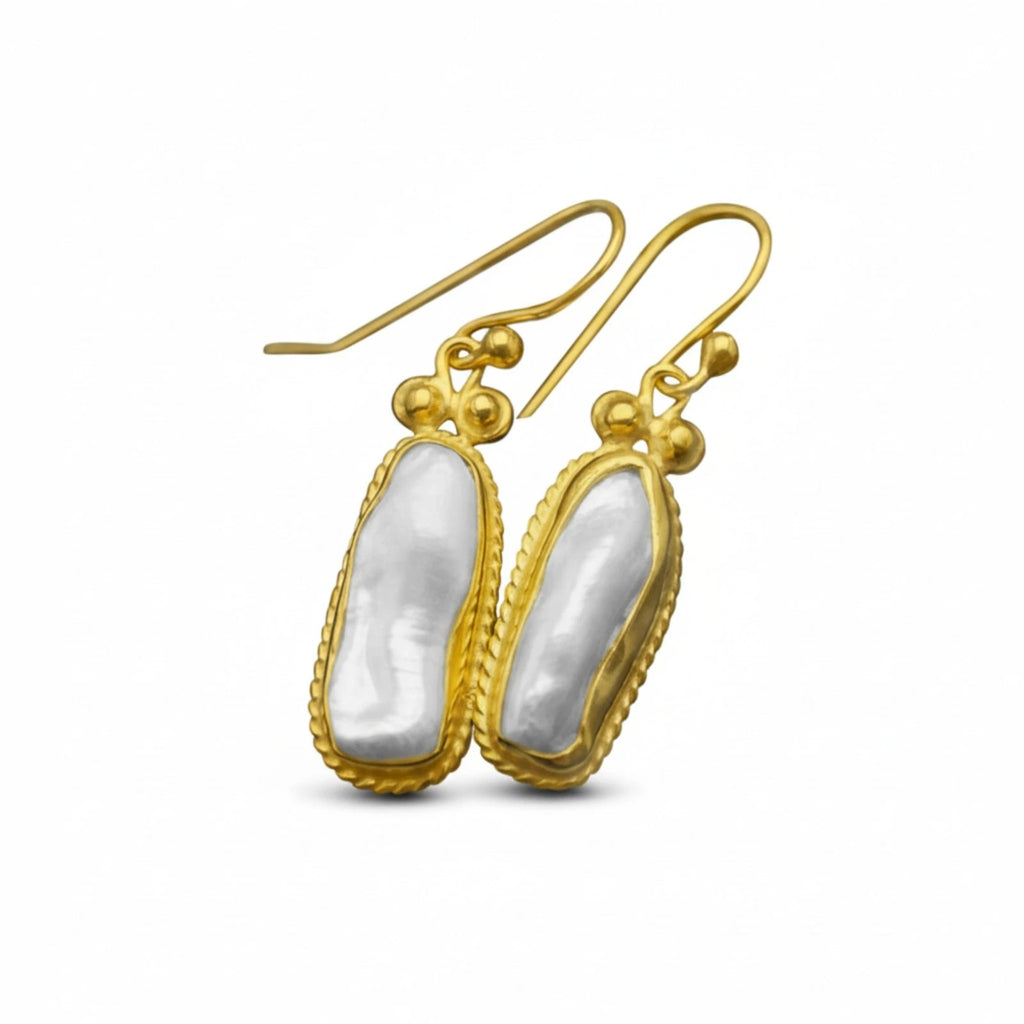 Freeform Pearl earrings handcrafted by designer Sultan in Bodrum atelier, 925 sterling silver Turkish jewelry symbolizing purity and natural beauty
