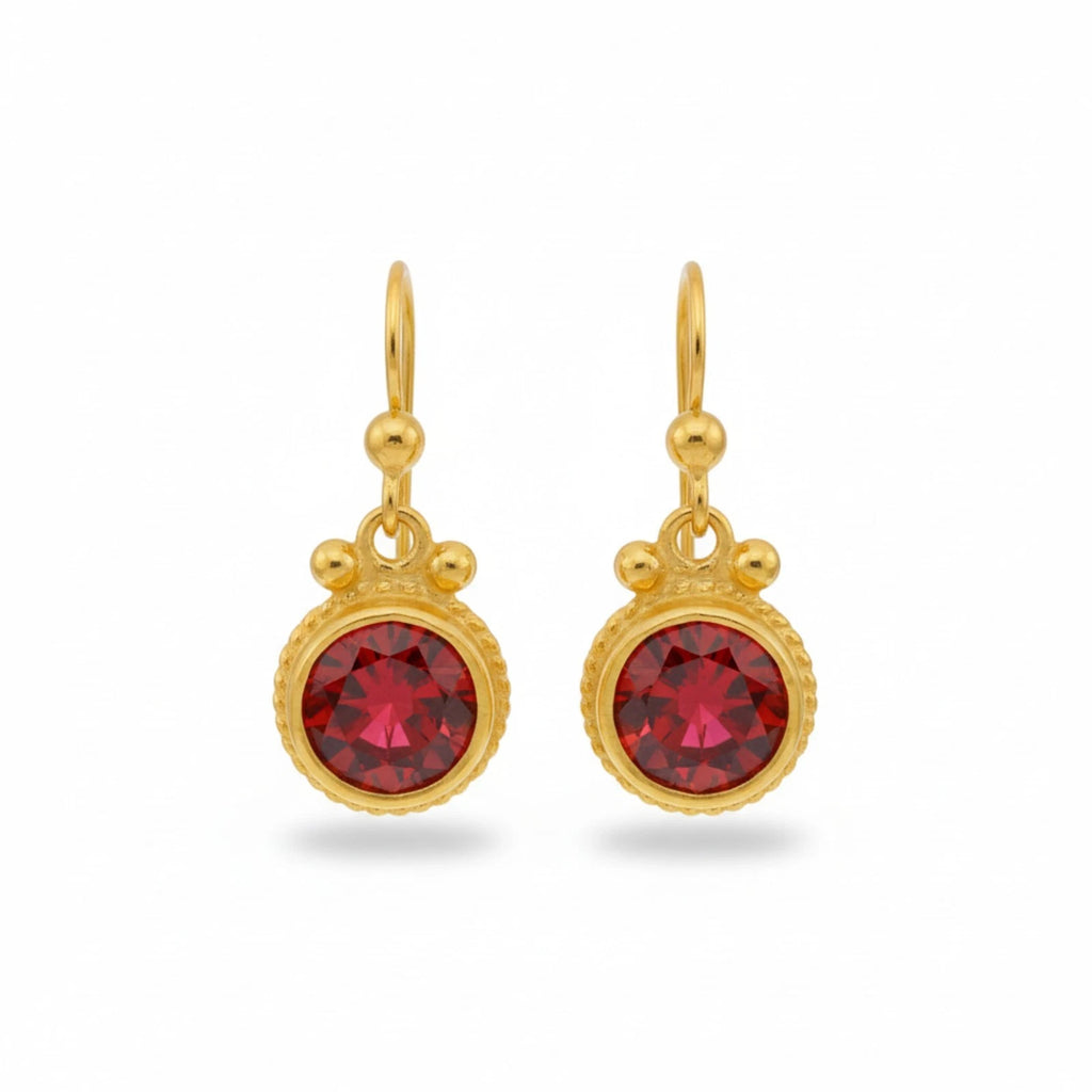 Garnet dangle earrings handcrafted by designer Sultan in Bodrum atelier, 925 sterling silver Turkish jewelry symbolizing passion and strength
