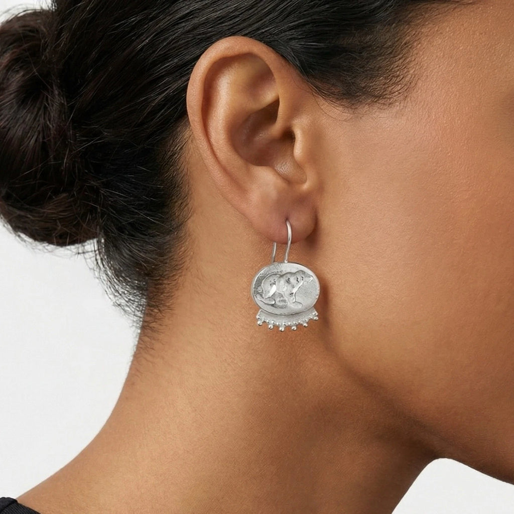 Turkish artisan grizzly bear coin earrings with strength symbol
