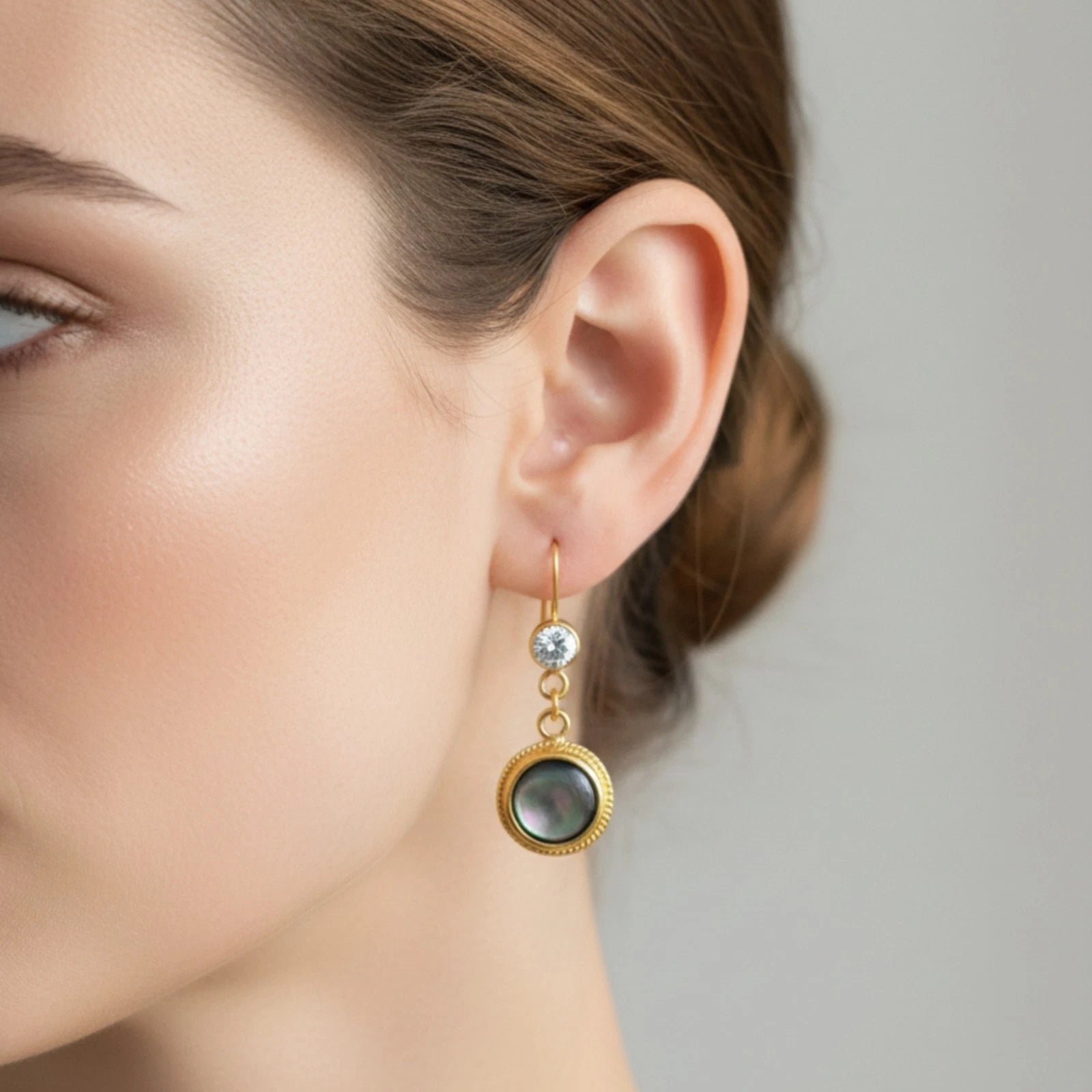 Mother of Pearl earrings handcrafted by designer Sultan in Bodrum atelier, 925 sterling silver Turkish jewelry symbolizing purity and serenity
