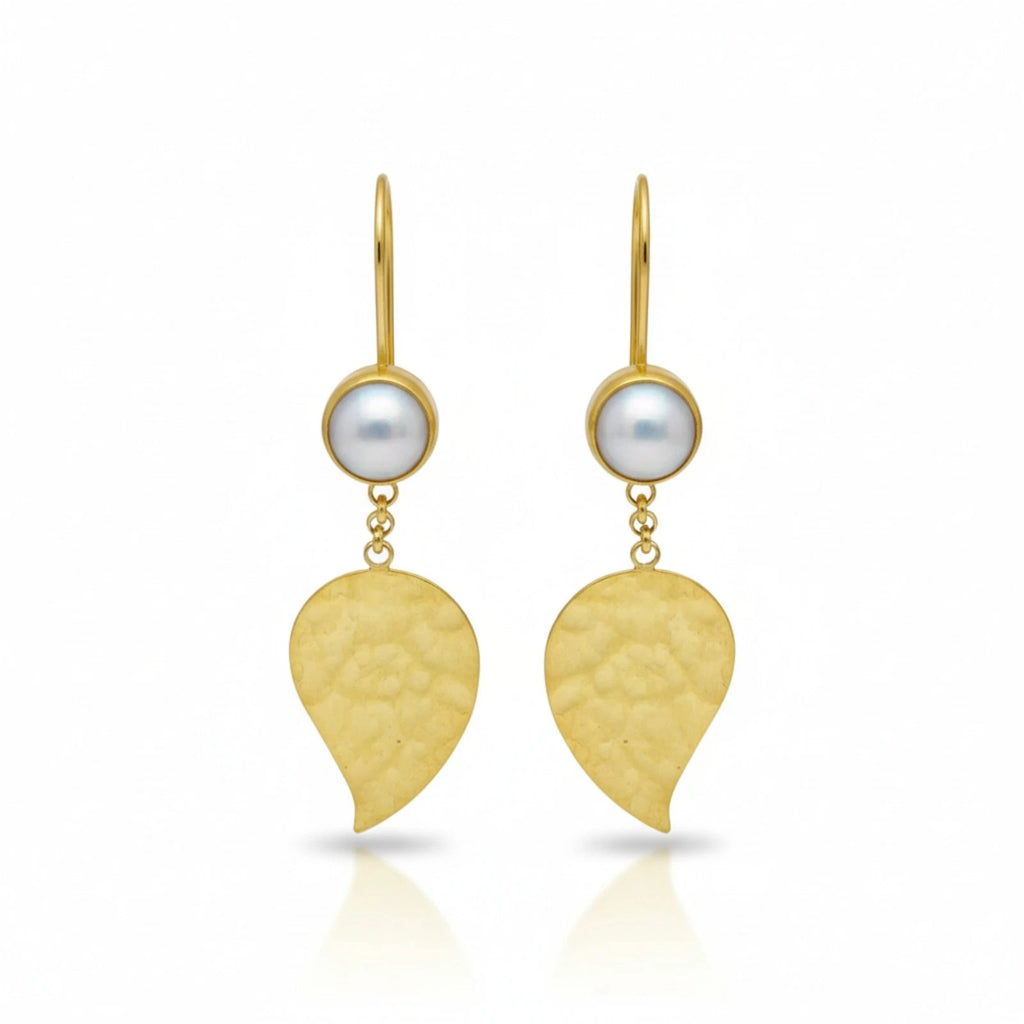 Pearl Leaf earrings handcrafted by designer Sultan in Bodrum atelier, 925 sterling silver Turkish jewelry symbolizing purity and natural beauty

