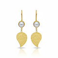 Pearl Leaf earrings handcrafted by designer Sultan in Bodrum atelier, 925 sterling silver Turkish jewelry symbolizing purity and natural beauty
