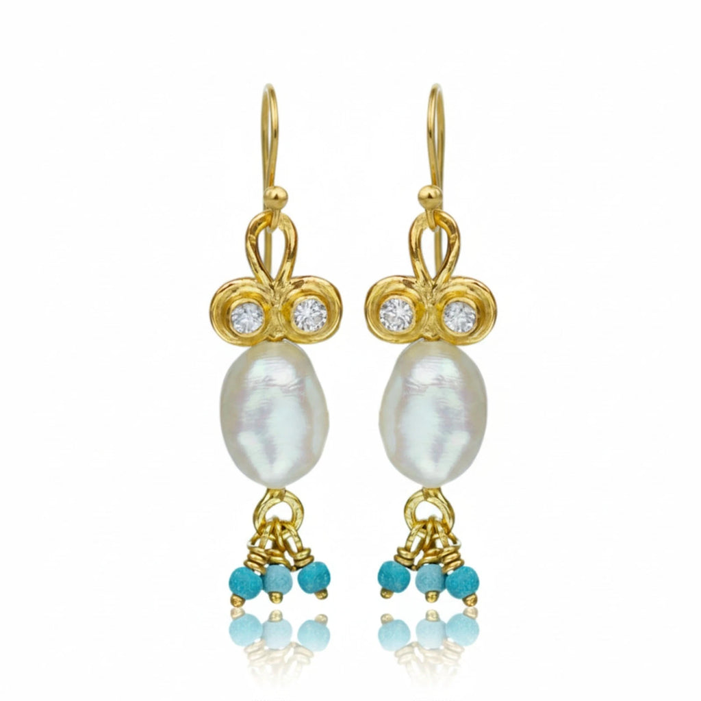 Pearl and Turquoise charm earrings handcrafted by designer Sultan in Bodrum atelier, 925 sterling silver Turkish jewelry symbolizing protection and purity
