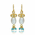 Pearl and Turquoise charm earrings handcrafted by designer Sultan in Bodrum atelier, 925 sterling silver Turkish jewelry symbolizing protection and purity

